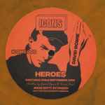 Copertina HEROES (ORANGE MARBLE VINYL) - 45 GIRI